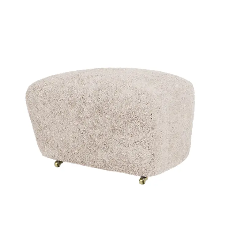 The Tired Man Sheepskin-Covered Ottoman 1